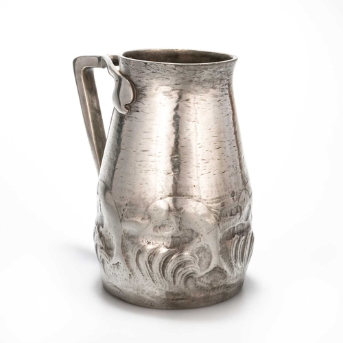 235 - A LIBERTY & CO TUDRIC PEWTER JUG no. 0174, chased with fish amidst waves, the sack-shaped body with ... 