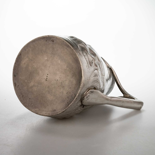 235 - A LIBERTY & CO TUDRIC PEWTER JUG no. 0174, chased with fish amidst waves, the sack-shaped body with ... 