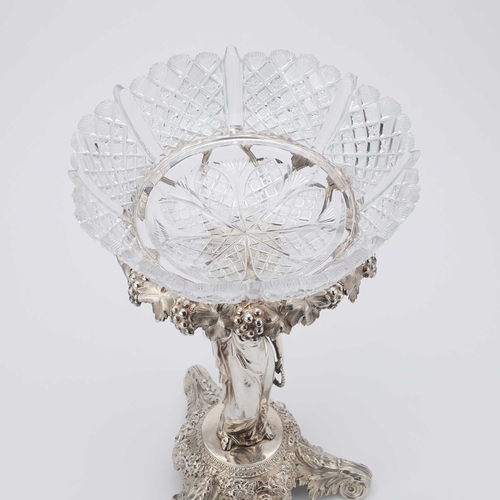 315 - A GEORGE IV SILVER TABLE CENTREPIECE maker SJ?, London 1825, the cut-glass circular bowl raised on a... 