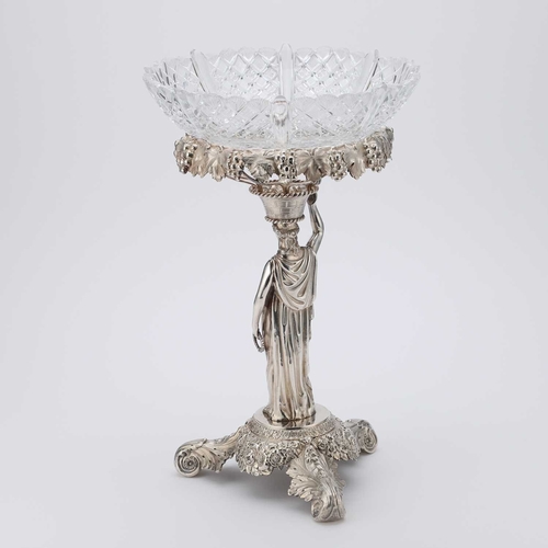 315 - A GEORGE IV SILVER TABLE CENTREPIECE maker SJ?, London 1825, the cut-glass circular bowl raised on a... 