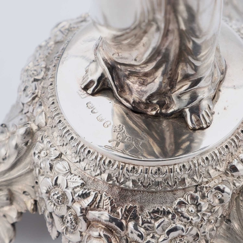 315 - A GEORGE IV SILVER TABLE CENTREPIECE maker SJ?, London 1825, the cut-glass circular bowl raised on a... 