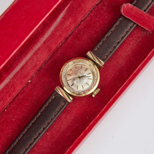 332 - A LADYS GOLD PLATED OMEGA STRAP WATCH circular silver dial signed Omega De Ville with gilt/black bat... 