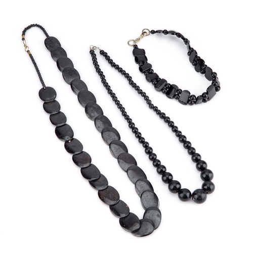 336 - THREE STRINGS OF BEADS (3) Longest 82cm