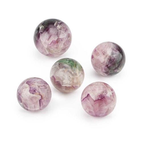 360 - A SET OF FIVE QUARTZ SPHERES (5) Largest 7cm diameter