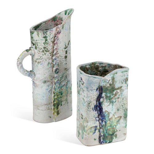 64 - A LARGE KELBROOK POTTERY JUG AND VASE each modelled with flowers, leaves and butterflies, labelled. ... 