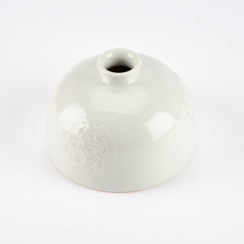 120 - A CHINESE WHITE-GLAZED 'BEEHIVE' WATER POT of classic 'taibai zun' form, the domed hemispherical bod... 