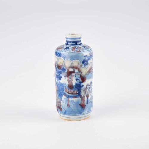 122 - A CHINESE COPPER-RED AND UNDERGLAZE BLUE SNUFF BOTTLE cylindrical, painted with figures, bears a fou... 