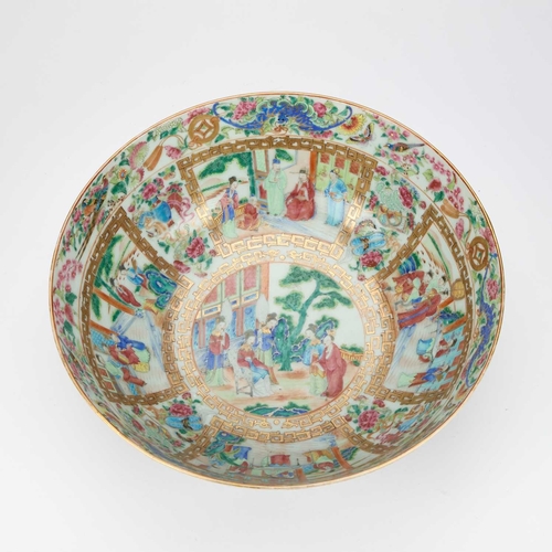 129 - A LARGE CANTON PORCELAIN FAMILLE ROSE BOWL, QING DYNASTY painted and gilt with elaborate scenes of c... 