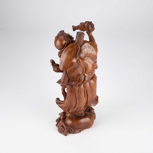 148 - A FINE JAPANESE HARDWOOD CARVING OF LI TIEH-KUAI 19th Century. 32cm high