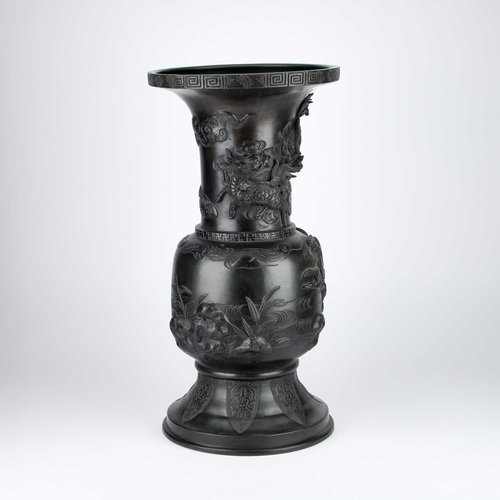 159 - A LARGE JAPANESE BRONZE VASE/ STAND, CIRCA 1890 decorated with dragons. 60.5cm high