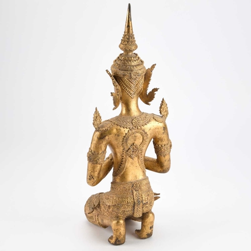 163 - A THAI GILT-METAL FIGURE OF A KNEELING THEPPHANOM 49cm high
 ... 