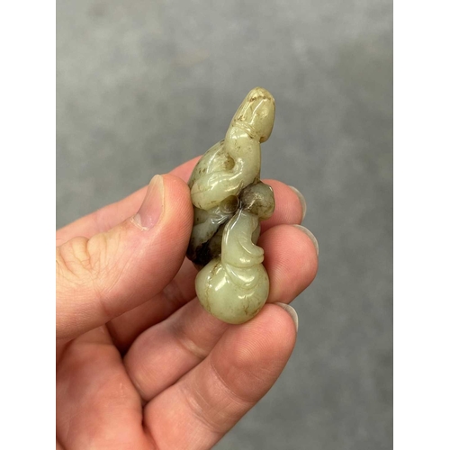 165 - A CHINESE JADE 'LINGZHI' CARVING AND A 'GOURD' CARVING (2) First 6cm longEach is in good condition w... 