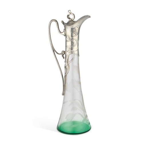 181 - WMF (WÃRTTEMBERGISCHE METALLWARENFABRIK), A LARGE SILVERED METAL AND GLASS CLARET JUG the clear to ... 