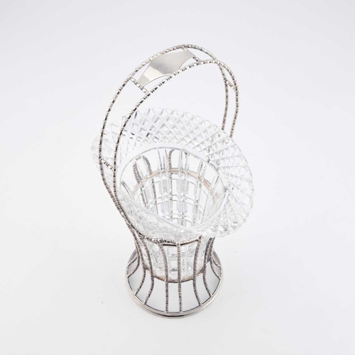 193 - A LARGE SILVER-PLATED AND GLASS CELERY BASKET with a fixed handle. 41cm high