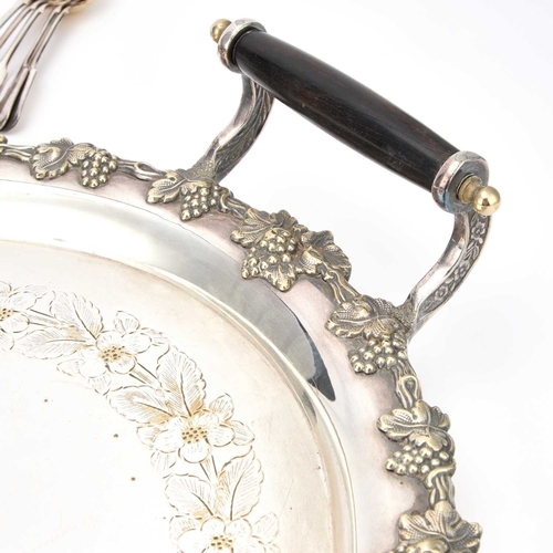 197 - A LARGE SILVER-PLATED TWO-HANDLED TRAY oval, with a grape and vine pattern border; together with a g... 