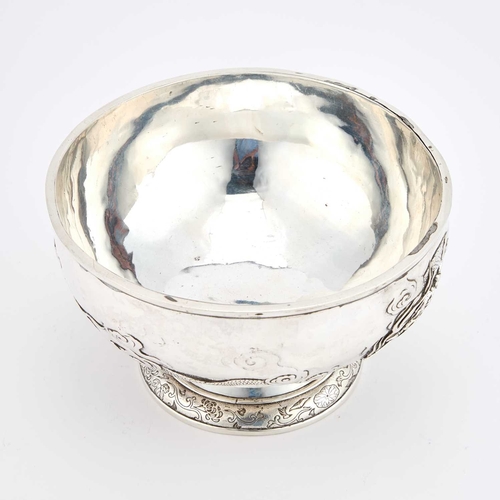 210 - A JAPANESE SILVER BOWL Meiji period, the double-skinned rounded sides decorated in relief with two d... 