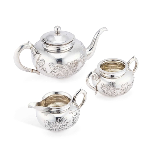 211 - Â§ A CHINESE SILVER THREE-PIECE TEA SERVICE the sugar bowl and cream jug with the mark of Wing Nam &... 