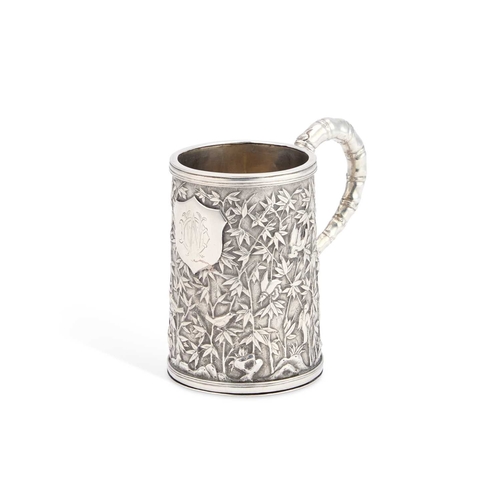 213 - A 19TH CENTURY CHINESE SILVER MUG retailer's mark S.S, with an artisan mark, the double-skinned stra... 