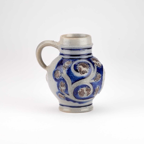 22 - A WESTERWALD STONEWARE JUG circa 1700, of almost globular form, applied with an oval titled equestri... 