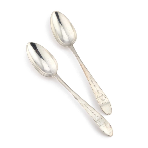 264 - A PAIR OF GEORGE III IRISH SILVER SERVING SPOONS maker J.S, Dublin 1787, with bright-cut decoration.... 