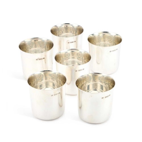 300 - A SET OF SIX ELIZABETH II SILVER BEAKERS by Sheffield Assay Office, Sheffield 1972, of plain rounded... 