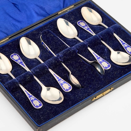 309 - A SET OF SIX EDWARDIAN SILVER AND ENAMEL TEASPOONS WITH SUGAR TONGS by A J Bailey, Birmingham 1907 a... 