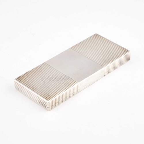 352 - CARTIER: AN ART DECO SILVER COMPACT by Cartier Ltd, London 1940, with double hinged covers, in the o... 