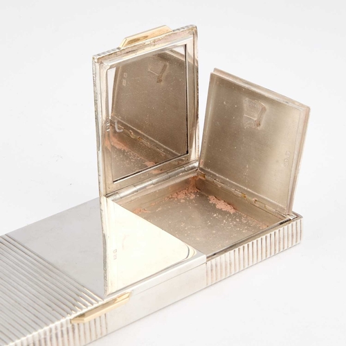 352 - CARTIER: AN ART DECO SILVER COMPACT by Cartier Ltd, London 1940, with double hinged covers, in the o... 