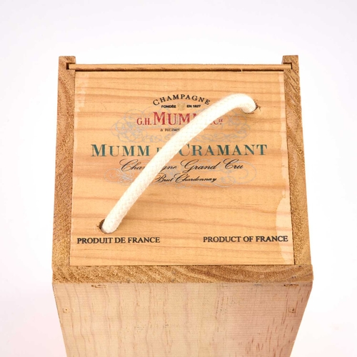 4 - A MAGNUM MUMM DE CRAMANT CHAMPAGNE GRAND CRU within a wooden case. 