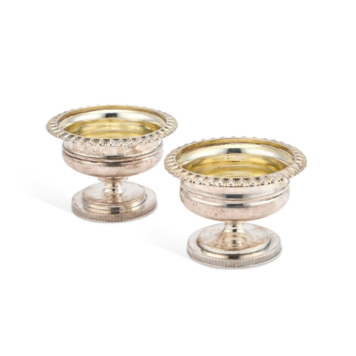 428 - A PAIR OF GEORGE III SILVER SALTS by John Emes, London 1806, of urn-form, each engraved with a monog... 