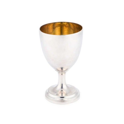 435 - A GEORGE III SILVER GOBLET maker's mark indistinct, London 1804, the ovoid bowl raised on a tapering... 