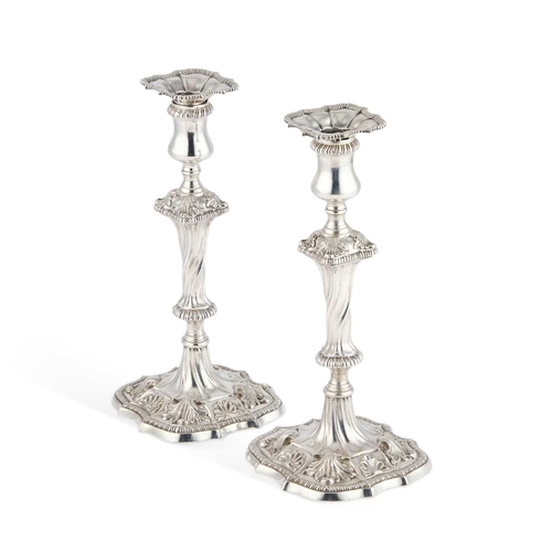 442 - A PAIR OF GEORGE III SILVER CANDLESTICKS probably by Ebenezer Coker, London 1768, each with a detach... 