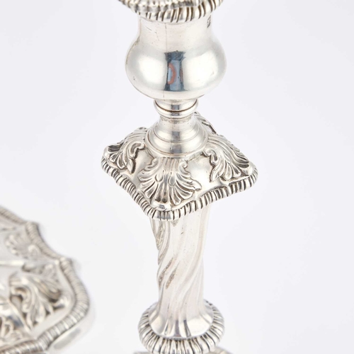 442 - A PAIR OF GEORGE III SILVER CANDLESTICKS probably by Ebenezer Coker, London 1768, each with a detach... 