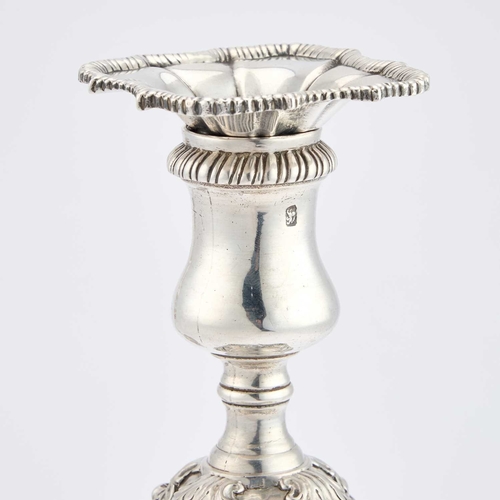 442 - A PAIR OF GEORGE III SILVER CANDLESTICKS probably by Ebenezer Coker, London 1768, each with a detach... 