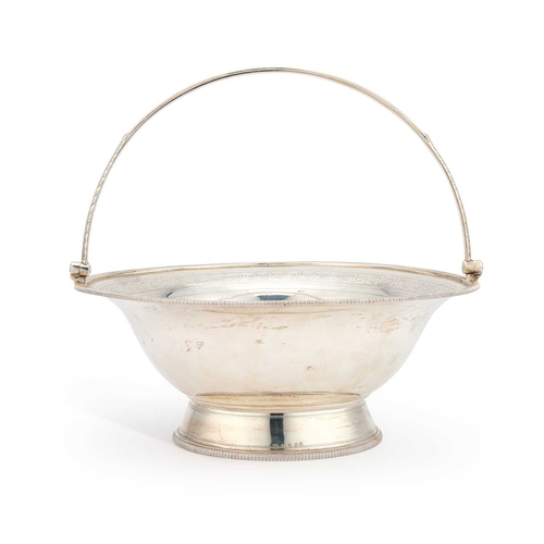 448 - A GEORGE III SILVER SWING-HANDLE CAKE BASKET by William Allen III, London 1803, of circular form, en... 