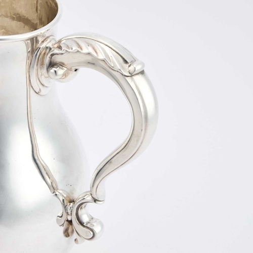 462 - A GEORGE II SILVER BEER JUG by Thomas Whipham, London 1748, of baluster form, the double scroll hand... 