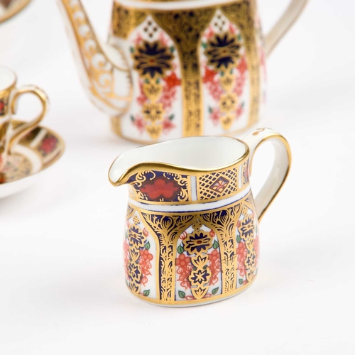 55 - A ROYAL CROWN DERBY IMARI MINIATURE TEA SERVICE comprising a teapot, sugar bowl, cream jug, cup and ... 