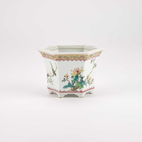 79 - A CHINESE FAMILLE ROSE JARDINIÃRE, REPUBLIC PERIOD of flared hexagonal form, finely enamelled with ... 