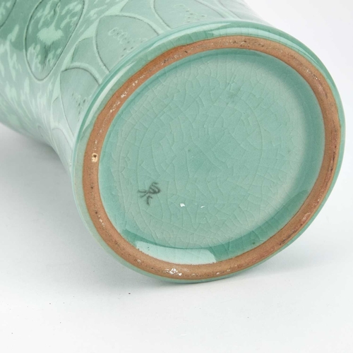 84 - A KOREAN CELADON-GLAZED MAEBYONG VASE decorated with cranes within roundels, signed. 25.5cm high... 