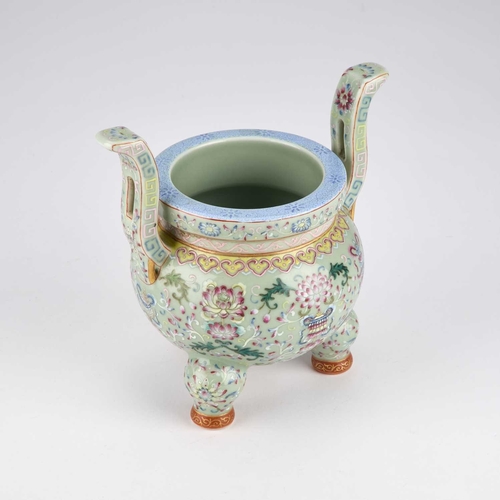 93 - A CHINESE FAMILLE ROSE 'BAJIXIANG' TWO-HANDLED TRIPOD CENSER the globular body decorated with The Ei... 