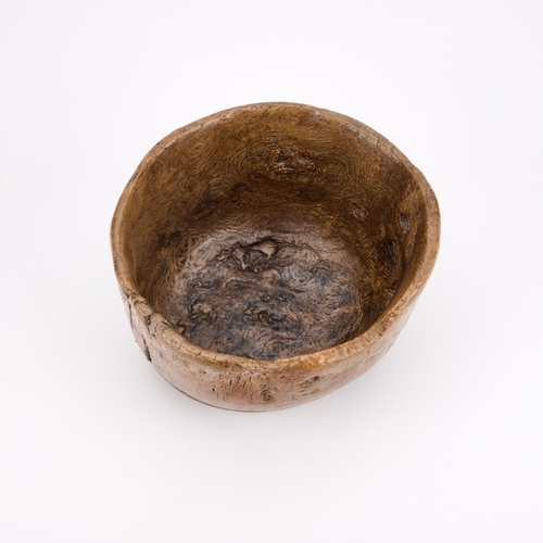 108 - AN EARLY TREEN BOWL, PROBABLY 17TH CENTURY 16.5cm diameter