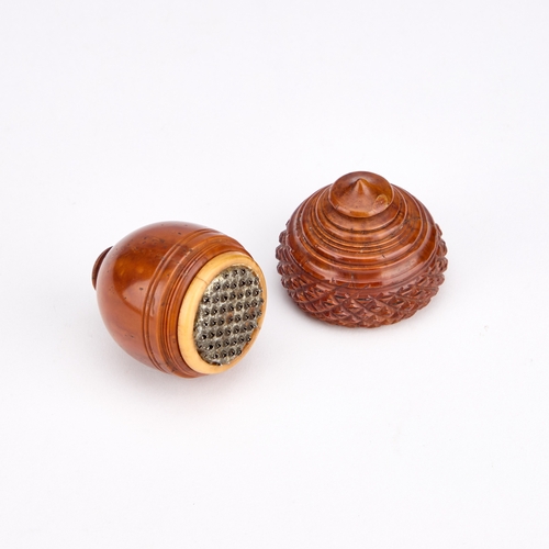 127 - A 19TH CENTURY COQUILLA NUTMEG GRATER in the form of an acorn. 7cm high