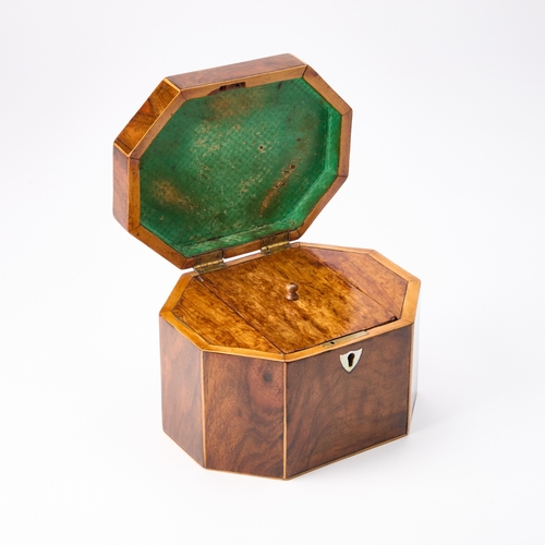 131 - AN EARLY 19TH CENTURY OCTAGONAL TEA CADDY the hinged lid inlaid with cube-parquetry, the interior wi... 