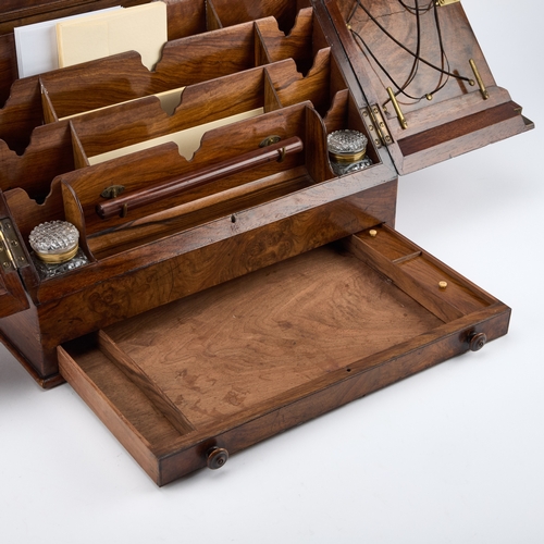 154 - A LARGE VICTORIAN BURR WALNUT SLANT-FRONT STATIONERY BOX the interior with inscribed mother-of-pearl... 