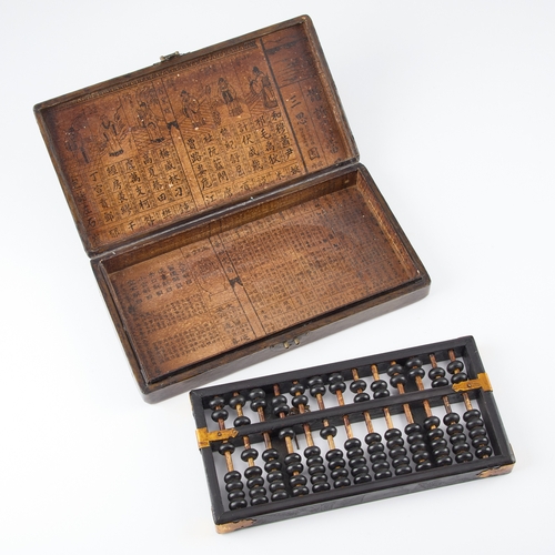 161 - A CHINESE ABACUS IN A GILT DECORATED LEATHER COVERED BOX Box 27cm long