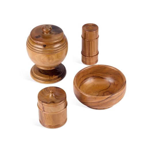 204 - FOUR PIECES OF OLIVE WOOD TREEN comprising a bowl, two lidded jars and covers and a cylindrical thre... 