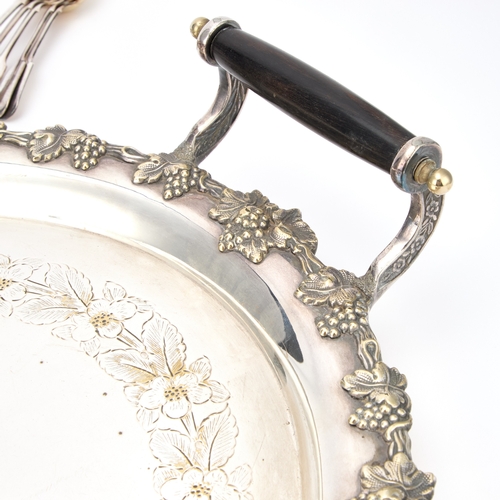 325 - A LARGE SILVER-PLATED TWO-HANDLED TRAY oval, with a grape and vine pattern border; together with a g... 