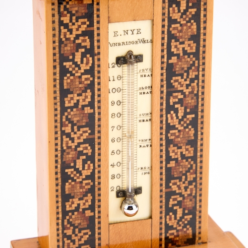 33 - Â§ A VICTORIAN TUNBRIDGE WARE DESK THERMOMETER BY EDMUND NYE the satinwood stepped base edged in geo... 