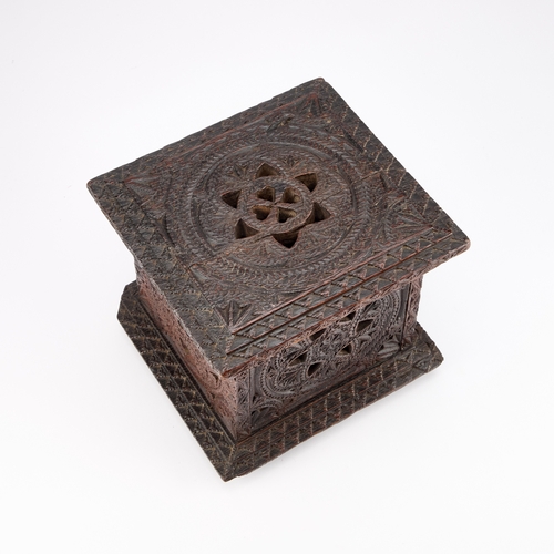 36 - AN 18TH CENTURY OAK CARRIAGE FOOT WARMER with carved and pierced decoration, raised on bun feet. 21c... 