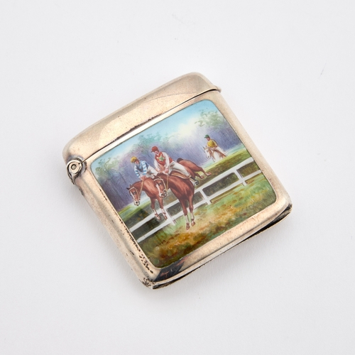 386 - A GERMAN SILVER AND ENAMEL VESTA CASE stamped '935', of rounded rectangular form, shaped for the poc... 